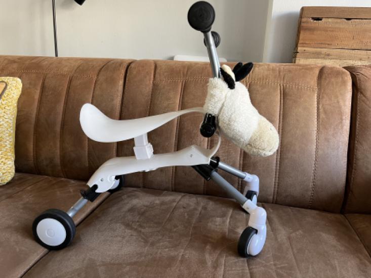 Opvouwbare loopfiets met koeienhoofd